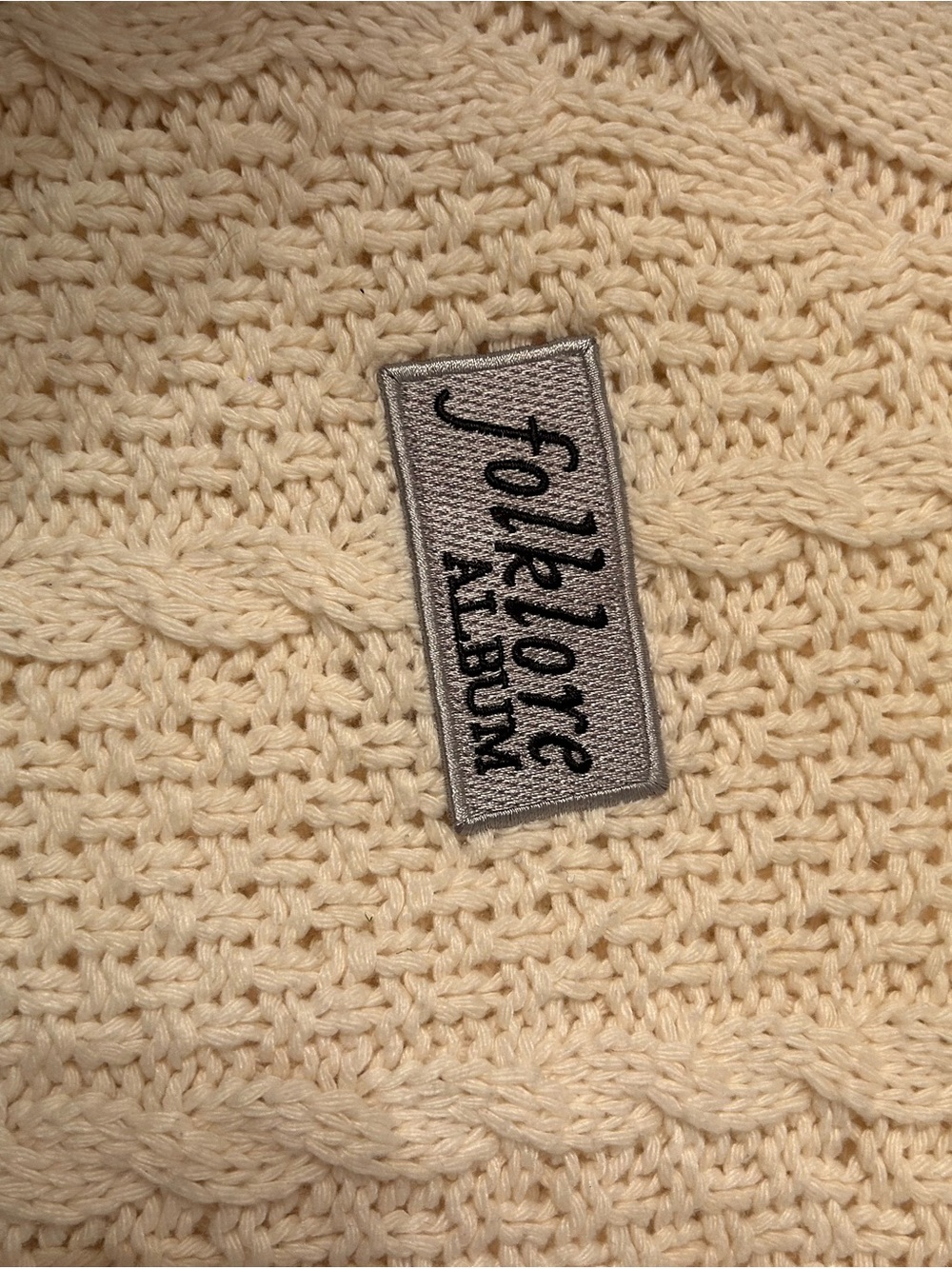 Taylor Swift Folklore Cardigan: Cable-Knit Cardigan with Black Trim - Picture 3 of 3